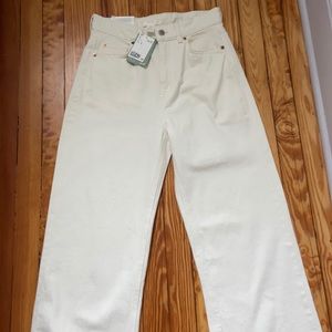 Newly Purchased high-waisted wide white jeans.